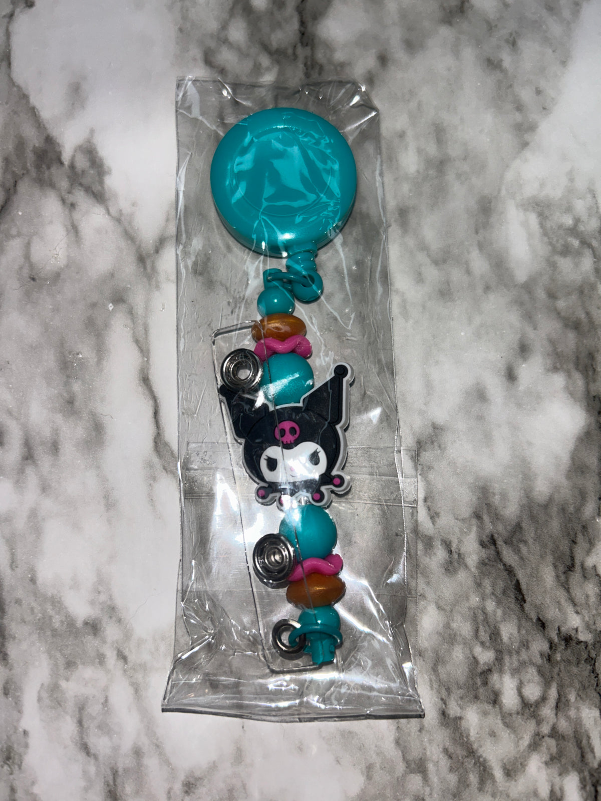 HK Badge Reel Turquoise and Black