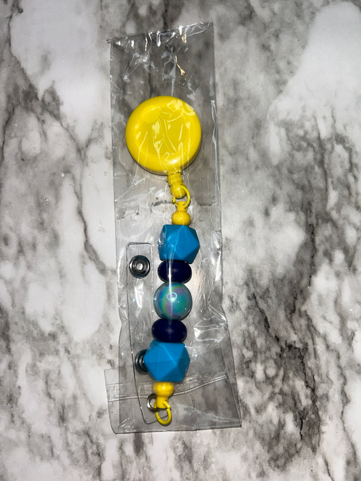 Badge Reel Yellow Blue Black